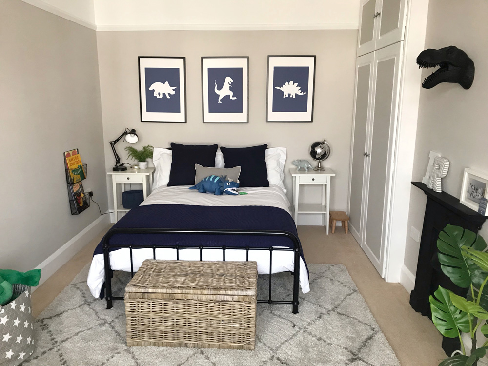 Stylish child's bedroom with a rattan storage trunk full of toys