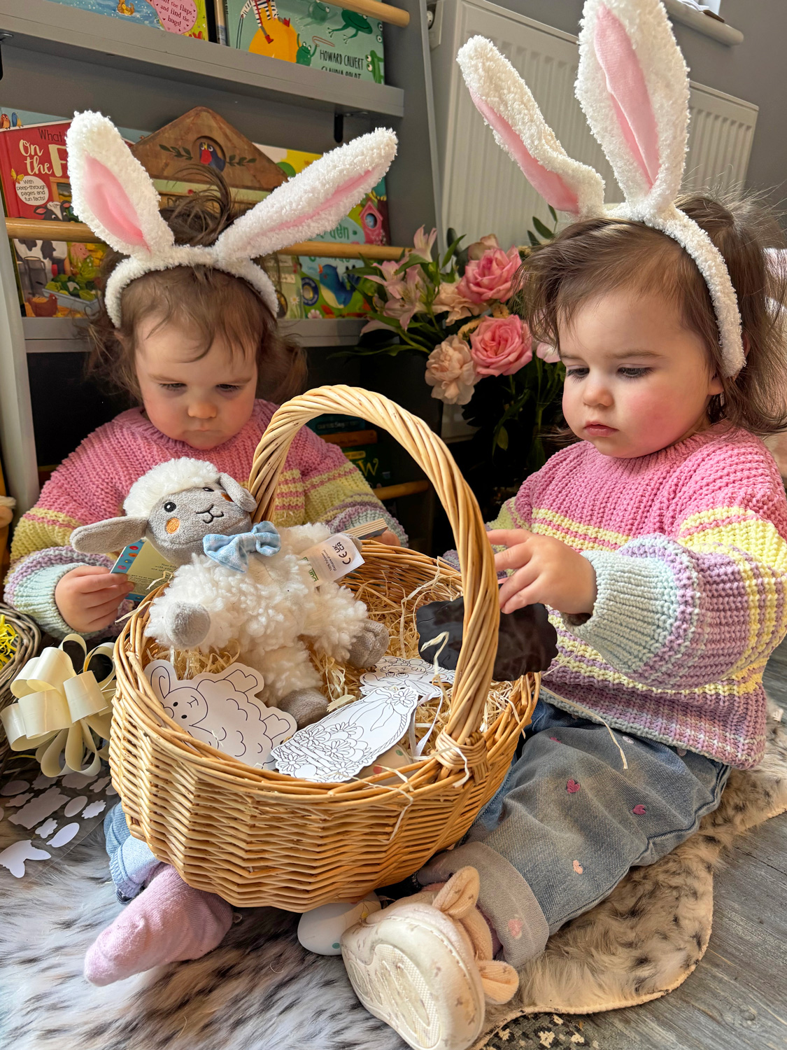 Children opening up their Easter basket gift