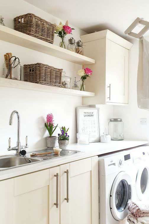 Light and airy utility room with grey & buff rectangular storage baskets on open shelves, ideal for tidy laundry essentials.